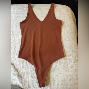 Abercrombie & Fitch neck vneck bodysuit in size medium. Never worn